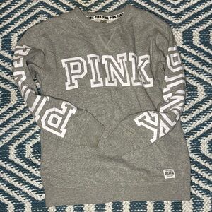 Pink- sweat shirt.